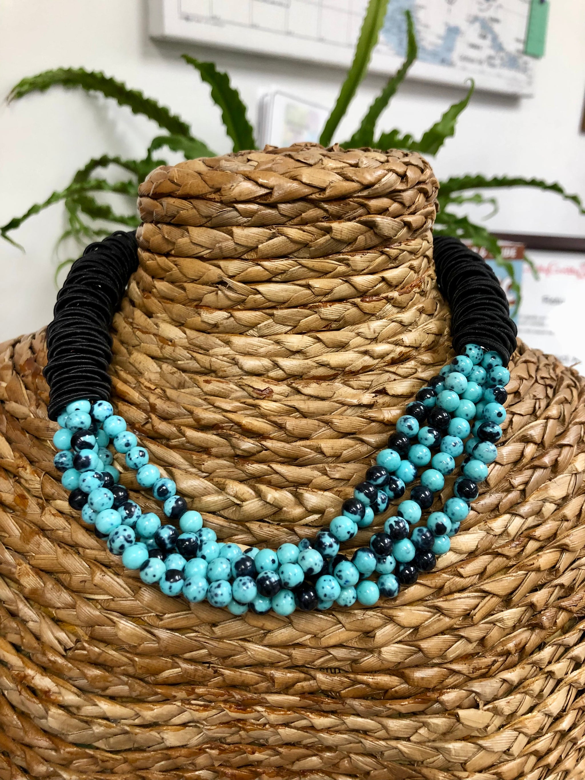 S96B - Black spring ring necklace wit multi rows of blue/black Imperial Jasper stones