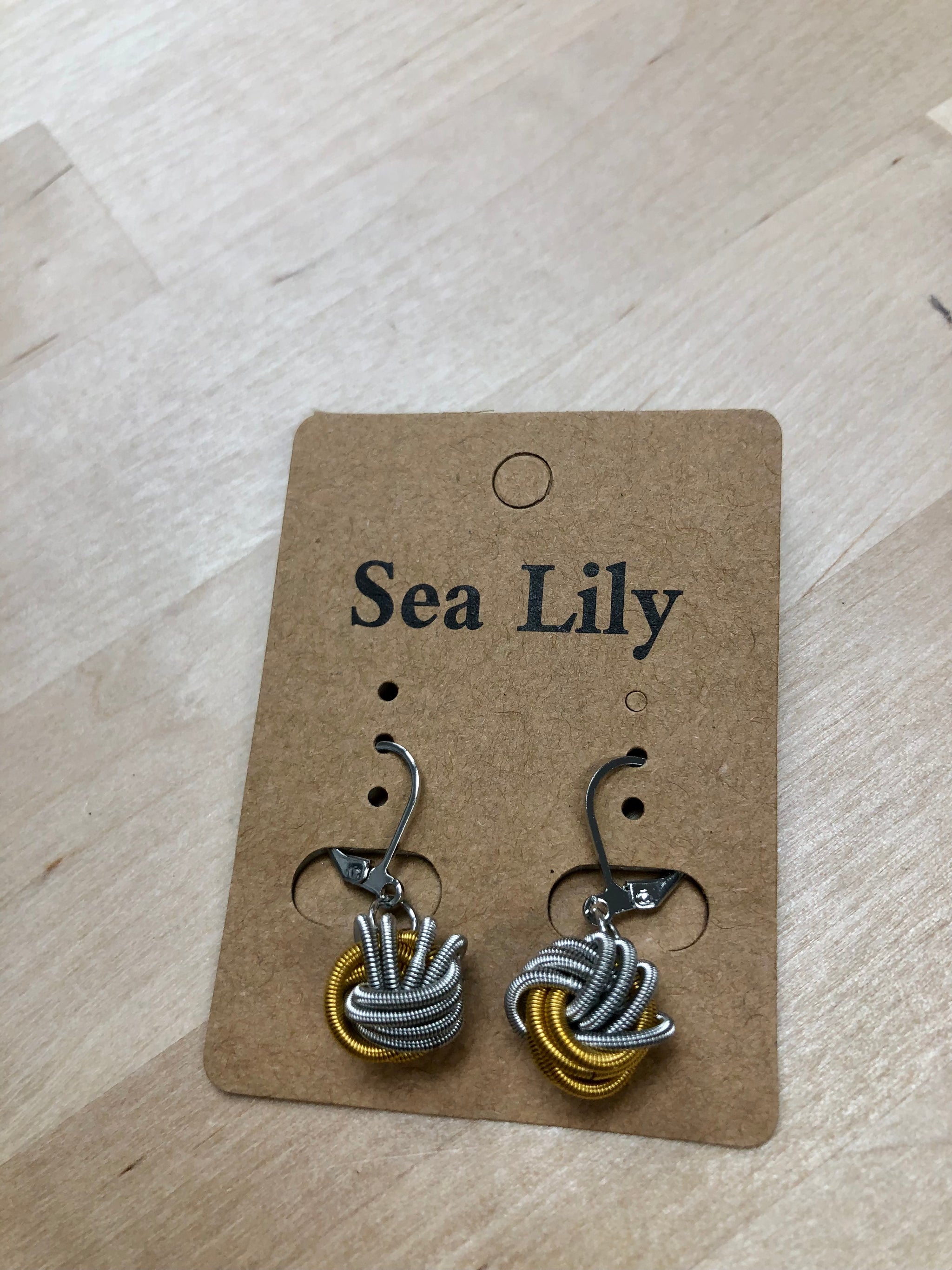 261 - multi piano wire knot earring